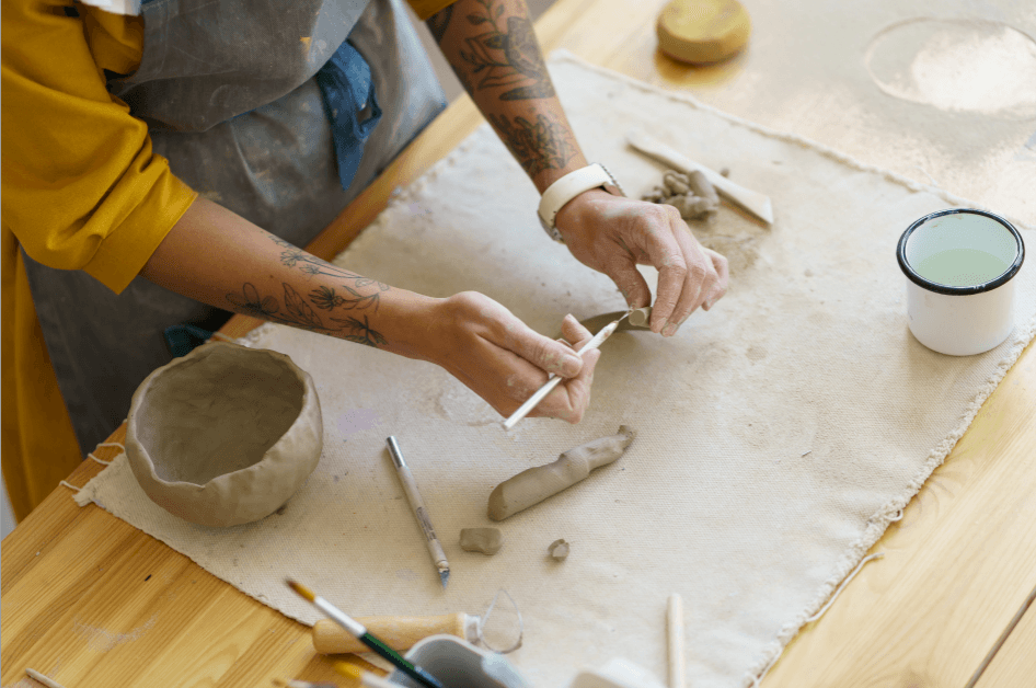 Pottery workshop with people creating ceramic art